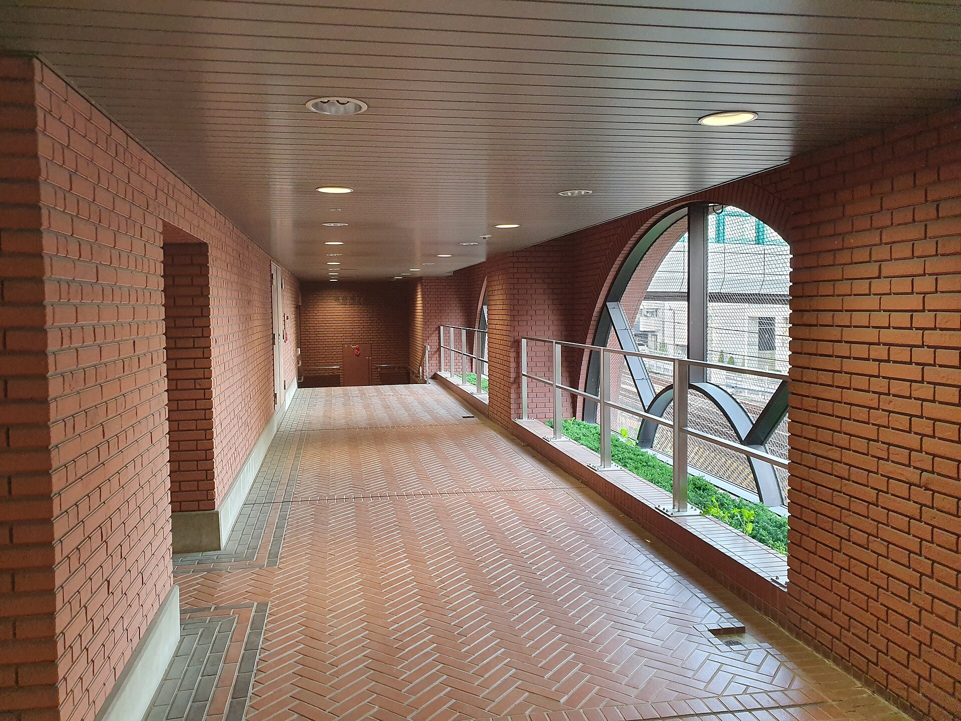 Yebisu Garden Place beside the Yamanote Line railway corridor