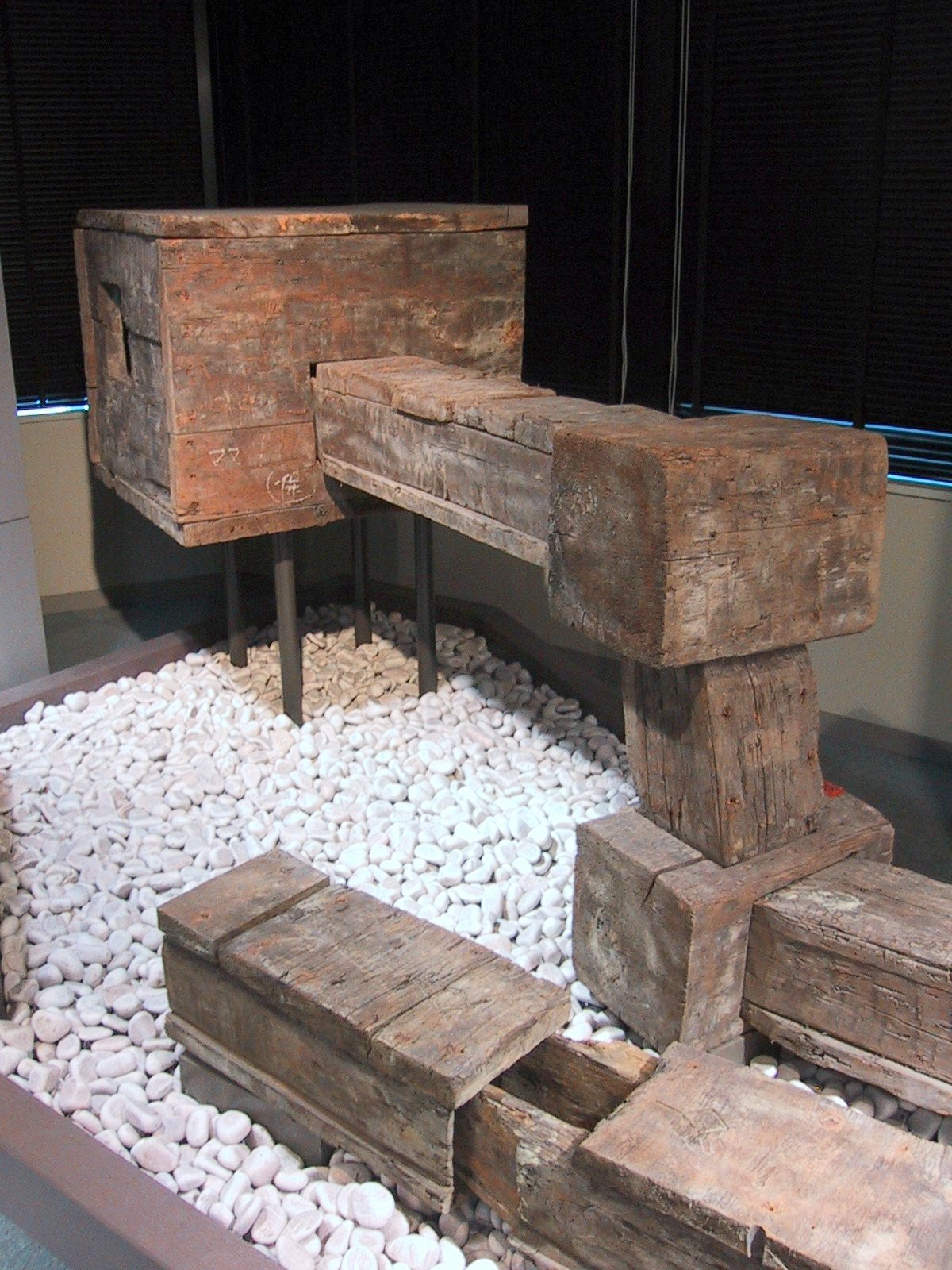 Historic wooden water pipes used underground in Edo and displayed at the Tokyo Waterworks Historical Museum