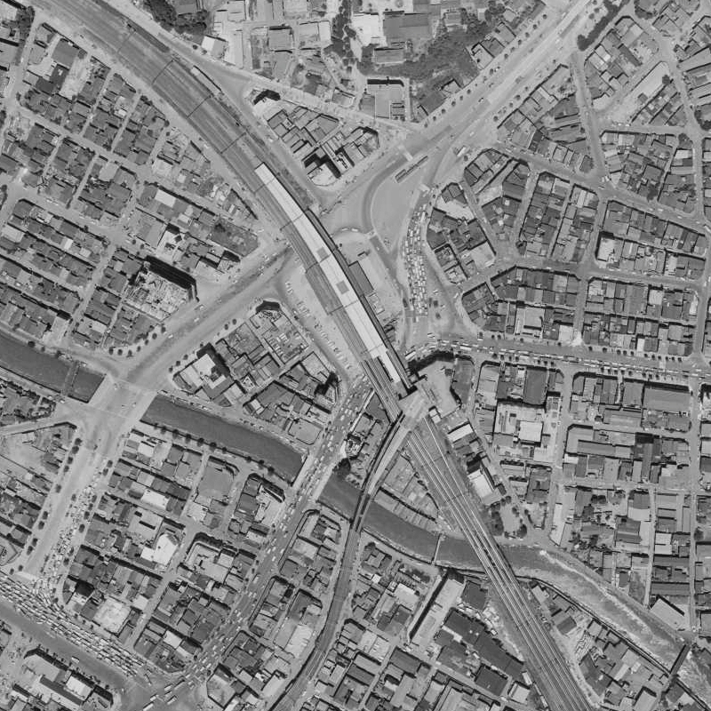Aerial view of Gotanda Station, the Meguro River and surrounding urban blocks in 1963