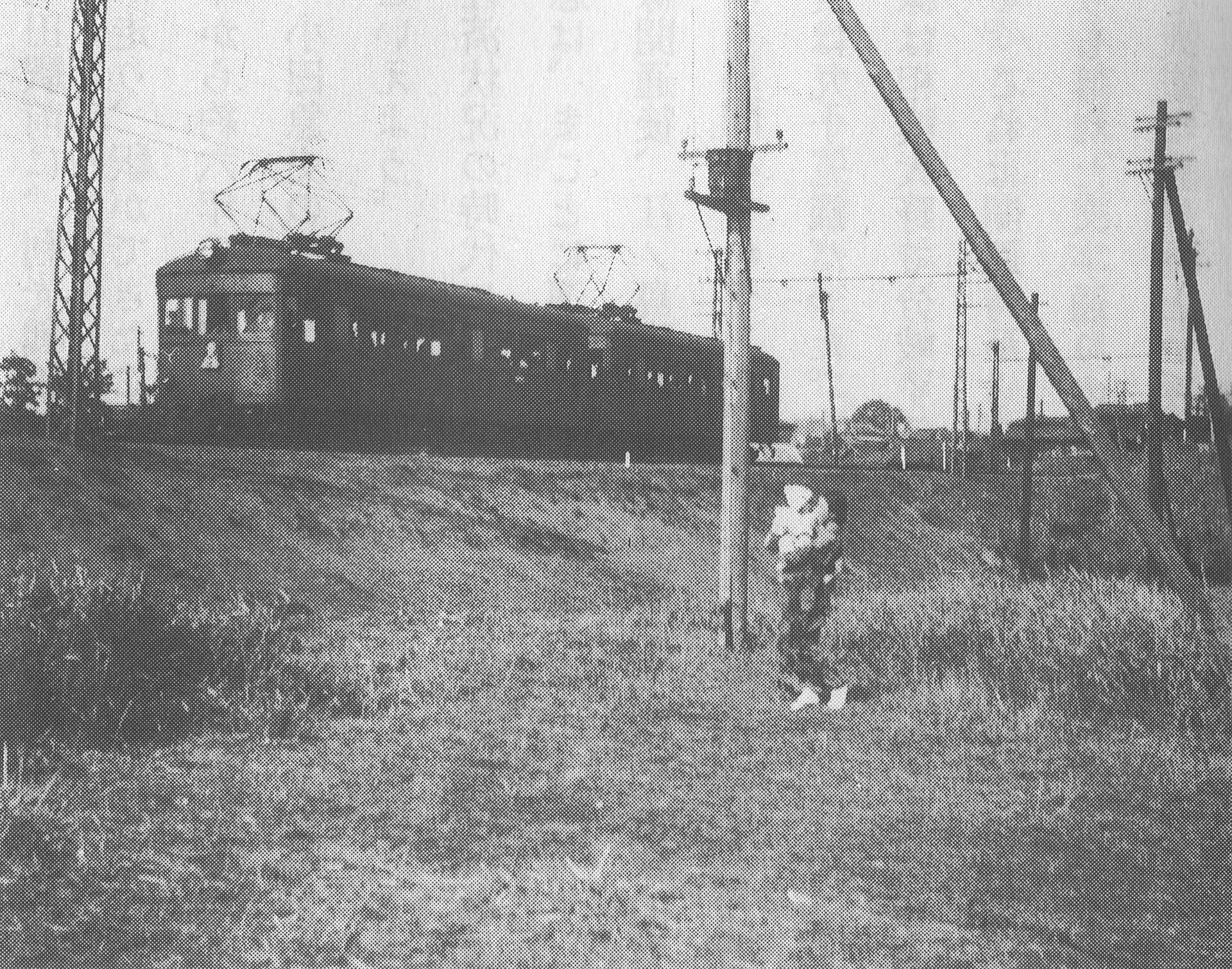 Odawara Express train running between Shimokitazawa and Higashi-kitazawa in 1936