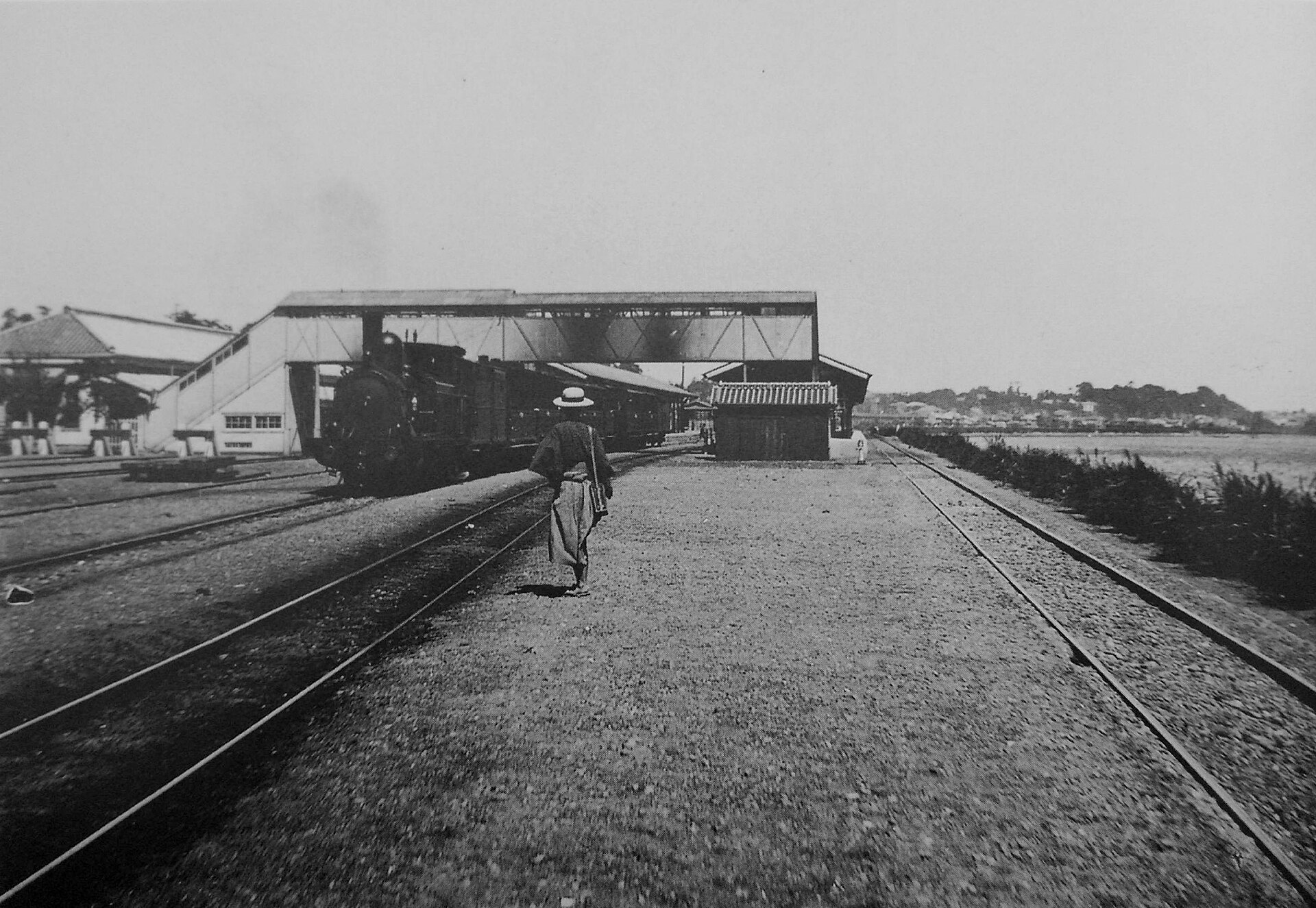 Shinagawa Station around 1897 with Tokyo Bay beside the railway