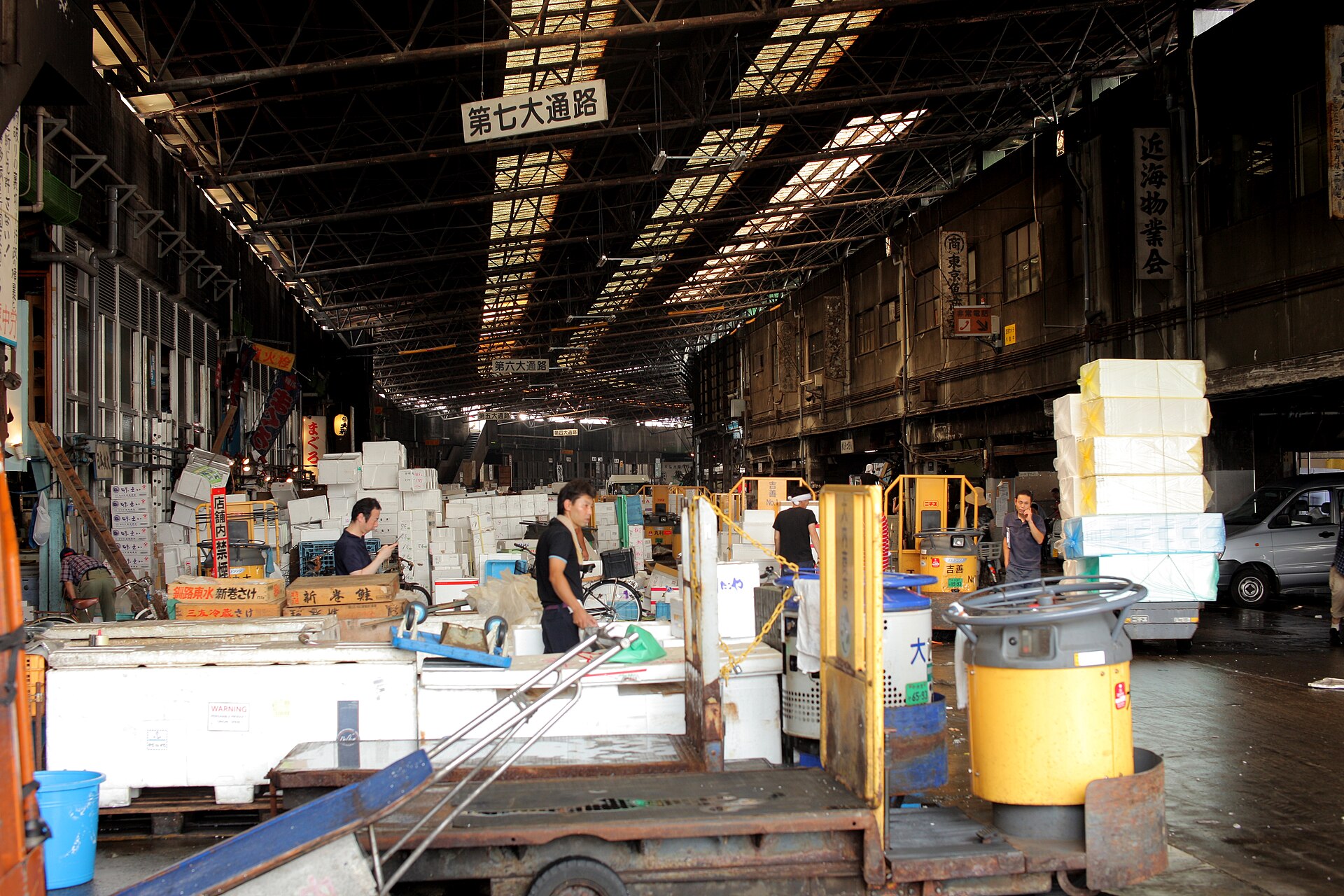 Workers inside the former Tsukiji wholesale fish market in 2013