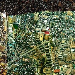 大蔵住宅の住棟と周辺市街地を写した1974年から1978年の空中写真
